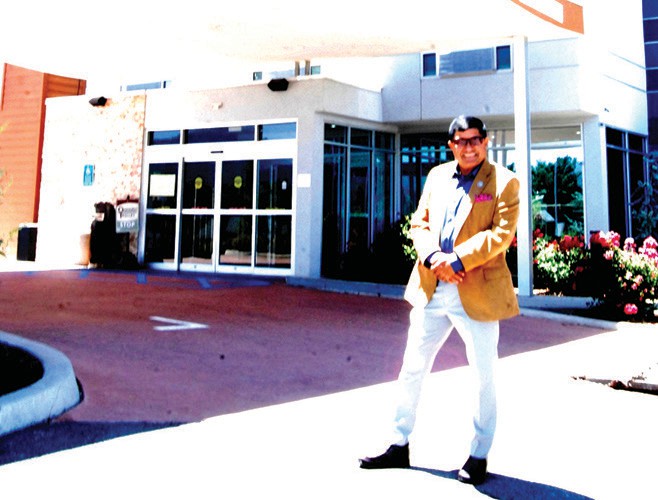 Kumar Sharma is pictured standing outside the the Fairfield Inn & Suites in Oakhurst, one of three hotels recently purchased by JSR Hospitality Group.